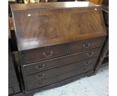 Reproduction mahogany fall front bureau in Georgian style, on bracket feet.(B.P. 24% incl. VAT)