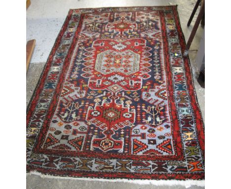 20th Century Middle Eastern design geometric carpet.(B.P. 24% incl. VAT)   CONDITION REPORT:  Approximately 197cm x 128cm