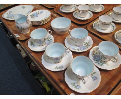 Two trays of Royal Standard bone china 'Fascination' design teaware, comprising: cups and saucers; milk jug; sucrier and plat