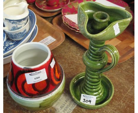 Poole Pottery baluster vase, together with a green glazed Ewenny style candlestick. (2)(B.P. 24% incl. VAT)