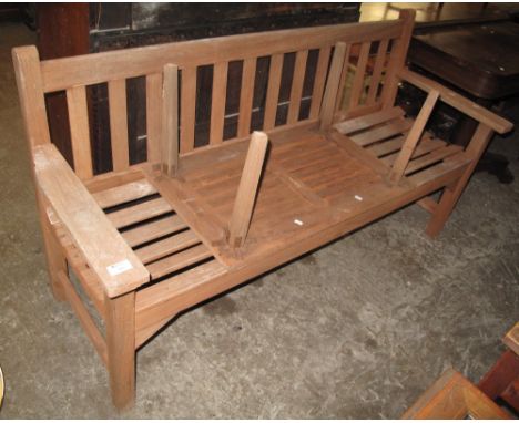 Modern teak garden bench with small matching occasional table. (2)(B.P. 24% incl. VAT)   CONDITION REPORT:  Dimensions of ben