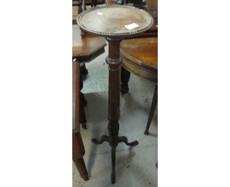 Mahogany torchere stand on fluted pedestal and tripod base.(B.P. 24% incl. VAT)