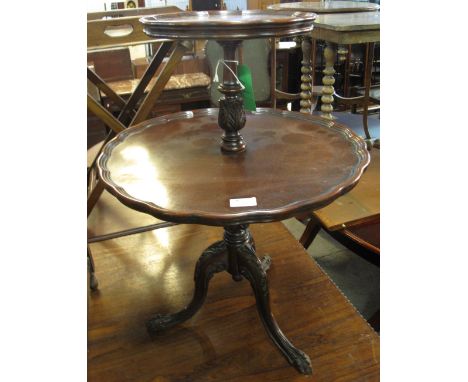 Good quality reproduction mahogany dumb waiter with two circular dished sections, on turned tripod carved legs.(B.P. 24% incl