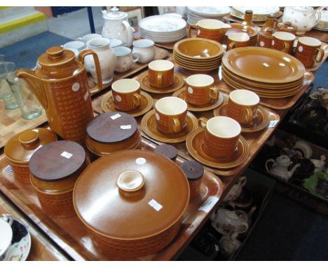 Four trays of Hornsea 'Saffron Retro' coffee wares and other items, comprising: coffee cups and saucers; milk jugs; bowls; co