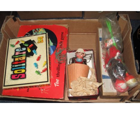 Tray of assorted games and toys to include: Pelham Puppet clown in original box; vintage metal puppet of Bill or Ben (The Flo