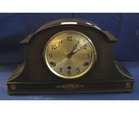 Mid 20th Century oak hat shaped mantel clock, three train movement.(B.P. 24% incl. VAT)