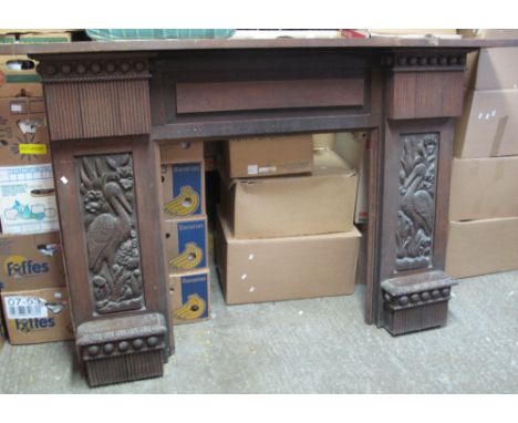 Early 20th Century oak mantelpiece, the panels carved with herons amongst foliage.(B.P. 24% incl. VAT)