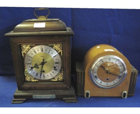 Large modern bracket type mantel clock with brass face, having silvered dial, with presentation plaque dated: 1992, Barcelona