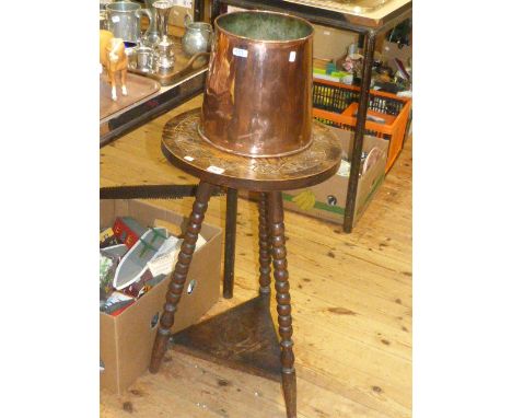 Circular carved oak bobbin legged triform occasional table and copper jardiniere