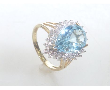 9ct gold, aquamarine and diamond ring, with pear-shaped mount and open shoulders, size L