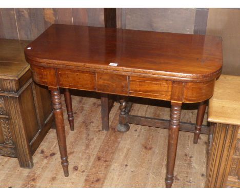 19th Century mahogany fold top tea table on ring turned legs