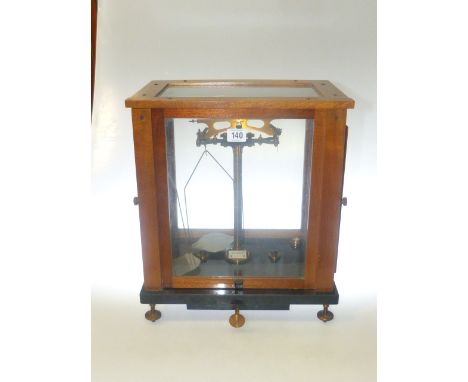 Cased set of balance scales