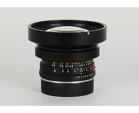 A Leitz Elmarit-R f/2.8 19mm Lens, black, serial no. 2736330, body, G-VG, elemenets, F, heavy internal haze and some marks to