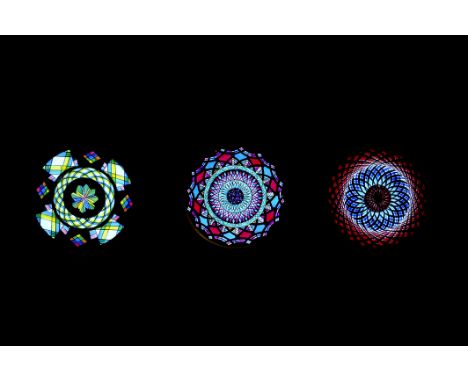 Mahogany-Mounted Hand-Coloured Rackwork Chromatrope Magic Lantern Slides, G, two with staple repairs (3)