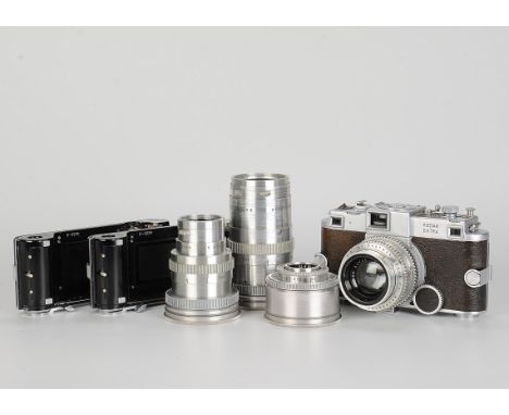 A Kodak Ektra Camera, chrome, serial no. 2916, with Ektar f/1.9 50mm lens, chrome, serial no. EY712, body, G-VG, shutter not 