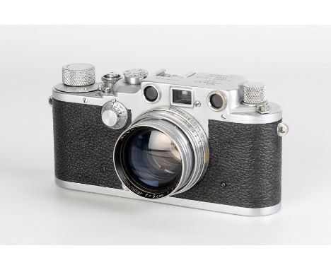 A Leica IIIc Luftwaffen-Eigentum Rangefinder Camera, chrome, serial no. 381638, with Leitz Summitar f/2 50mm lens, chrome, se