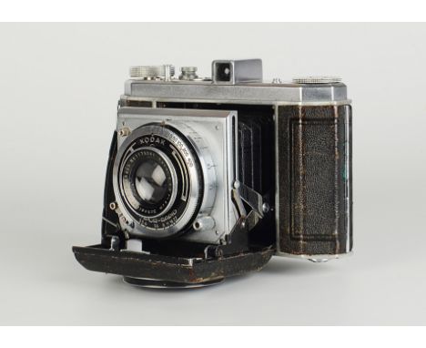 A Kodak Suprema Camera, chrome, serial no. 216276K, with Schneider Xenar f/3.5 80mm lens, serial no. 1179241, body, G-VG, len