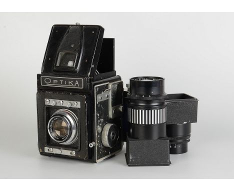 A Musashino-Koki Optica IIa Camera, black, serial no. 43157, with Luminant f/3.5 105mm lens, chrome, serial no. 60734, body, 