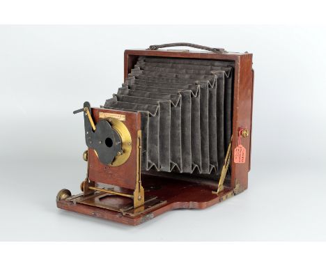 A J. Lancaster Le Merveilleux Mahogany Field Camera, 6½x4¾, with J. Lancaster lens in shutter, body, F-G, front standard not 