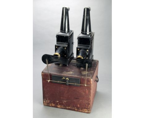 A pair of painted tinplate and brass Phantasmagoria Dissolving Lanterns, with single-draw lenses, with sprung gates, side doo