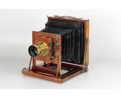 An Unmarked Mahogany Field Camera, 6½x4¾, posibily Thornton Pickard Ruby, with unmarked f/8 brass lens, body, VG, bellows pos