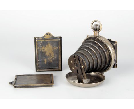 A rare A J. Lancaster & Sons Pocket Watch Camera, 2x1½” diam. nickel-plated body, with six-part sprung telescopic section Gru