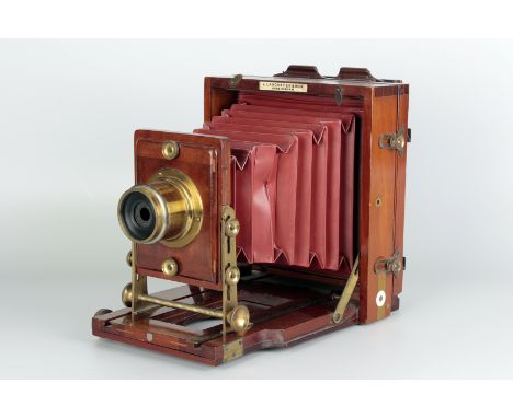 A J. Lancaster & Sons 1891 Instantograph Mahogany Field Camera, 6½x4¾, with J. Lancaster & Sons f/10 brass lens, body, VG, be