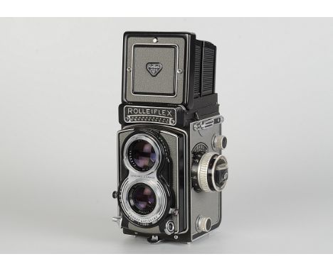 A Rolleiflex 3.5 T TLR Camera, grey, serial no. 2126849, with Carl Zeiss Tessar f/3.5 75mm lens, body, VG, shutter sticking, 