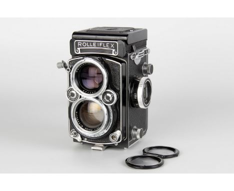 ANNOUNCEMENT: This is a E3, not a E4
A Rolleiflex 2.8 E4 TLR Camera, black, serial no. 2360284, with Carl Zeiss Planar f/2.8 