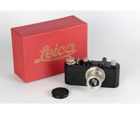 A Leica Standard Model E Camera, black with nickel fittings, serial no. 188400, with Leitz Elmar f/3.5 50mm lens, nickel, ser