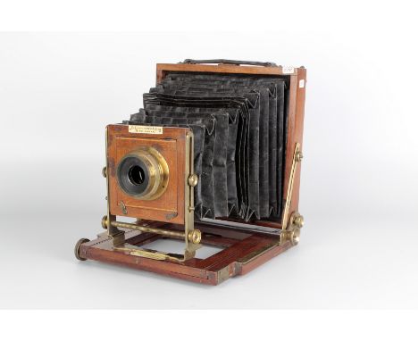 A J. Lancaster & Sons 1900 Instantograph Mahogany Field Camera, 6½x4¾, with J. Lancaster f/8 brass lens, body, G, lacking gro