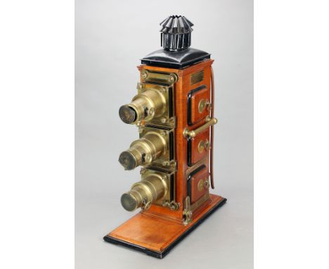 A fine and rare ‘Noakes Triple’ mahogany and brass No. 3 Patent Triunial Magic Lantern, with three single-draw rack and pinio