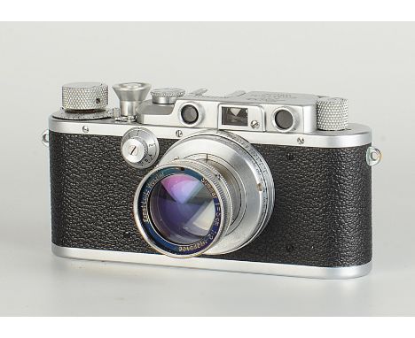 A Leica IIIa Rangefinder Camera, chrome, serial no. 275328, with Leitz Summar f/2 50mm lens, chrome, serial no. 229406, body,