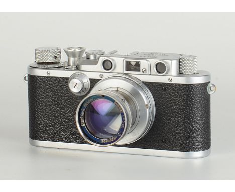 A Leica IIIa Rangefinder Camera, chrome, serial no. 275328, with Leitz Summar f/2 50mm lens, chrome, serial no. 229406, body,