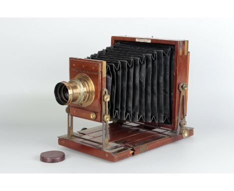 A J. Lancaster & Sons Special Instantograph Mahogany Field Camera, 6½x4¾, with J. Lancaster & Sons ½ Plate Rectigraph f/10 br