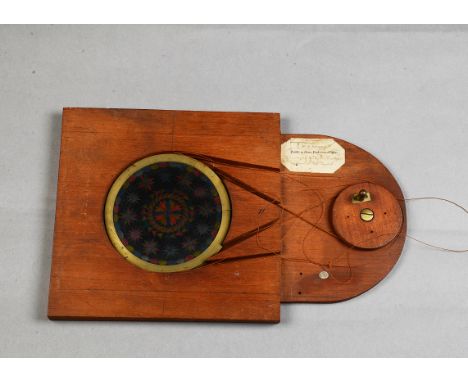 A rare and large Henry Langdon Childe Mahogany-Mounted and Brass Hand-Painted Chromatrope, pair of pulley-operated contra-rot
