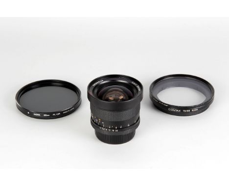 A Carl Zeiss Distagon T* f/4 18mm Lens, black, serial no. 5998926, body, VG, elements, VG, some light internal haze, together