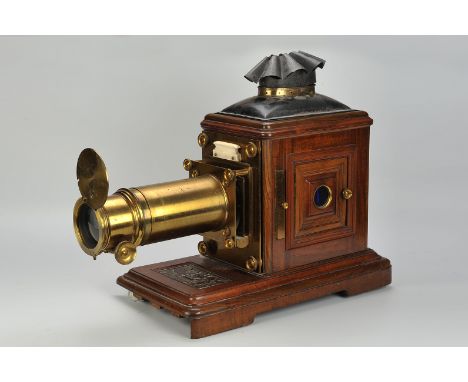 A fine W C Hughes mahogany and lacquered brass Pamphengos Double-Extension Magic Lantern, with massive brass lens and lantern