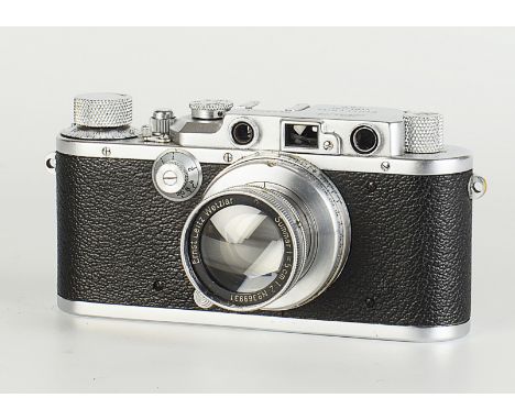 A Leica III Model F Rangefinder Camera, chrome, serial no. 167212, with Leitz Summar f/2 50mm lens, chrome, serial no. 369931
