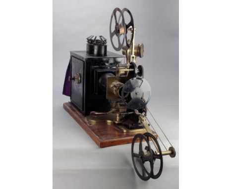 A Wrench 35mm cast-iron, brass and tinplate Hand-Crank Model AA Cinematograph Projector, dog movement, with interchangeable m