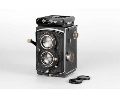 A Rolleiflex Old Standard TLR Camera, black, serial no. 393347, with Carl Zeiss Jena Tessra f/3.5 75mm lens, serial no. 16646