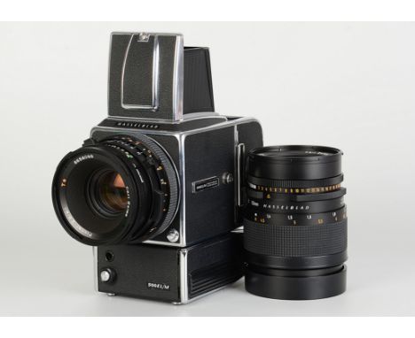 A Hasselblad 500EL/M Camera, chrome, serial no. RH1324433, with Carl Zeiss Planar Prontor CF T* f/2.8 80mm lens, black, seria