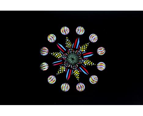 A Carpenter & Westley mahogany-mounted hand-coloured Chromatrope Magic Lantern Slide, G, notch cut in top