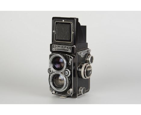 A Rolleiflex 2.8E TLR Camera, black, serial no. 1642208, with Carl Zeiss Planar f/2.8 80mm lens, serial no. 1931818, body, G-