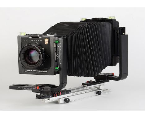 A Linhof Technikardan Mono-Rail Camera, 5x4”, black, with Schneider APO-Symmar f/5.6 210mm lens, black, serial no. 14569731, 