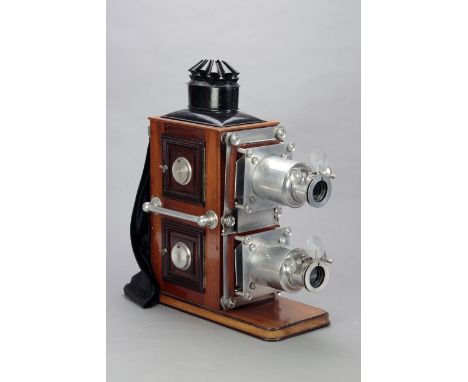 A mahogany, aluminium and tinplate Biunial Magic Lantern probably by J Wrench, with aluminium 6in. lenses, lens mounts with a