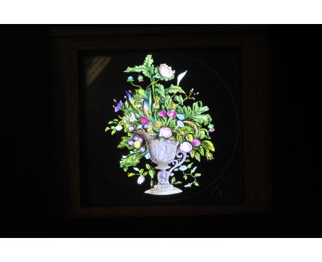 A Newton & Co Floral Arrangement and Butterflies hand-painted mahogany-mounted Magic Lantern Dissolve Set, 3¼in. square, stat