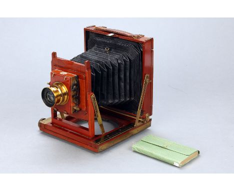 A Thornton Pickard Imperial Triple Extension Mahogany Field Camera, 6½x4¾, with Beck Symmetrical f/8 brass lens, body, VG, le