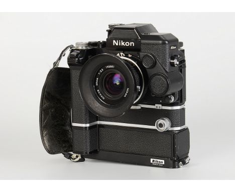 A Nikon F2 AS SLR Camera, black, serial no. 7963563, with Nikkor Ai f/3.5 20mm lens, black, serial no. 193881, body, VG, shut