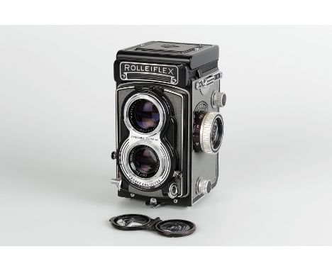 A Rolleiflex T TLR Camera, grey, serial no. 2133330, with Carl Zeiss Tessar f/3.5 75mm lens, serial no. 1675171, body, VG, sh
